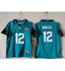 Women Jacksonville Jaguars 12 Travis Hunter Teal 2024 F U S E Vapor Limited Stitched Football Jersey Women Jacksonville Jaguars 12 Travis Hunter Teal 2024 F U S E Vapor Limited Stitched Football Jersey